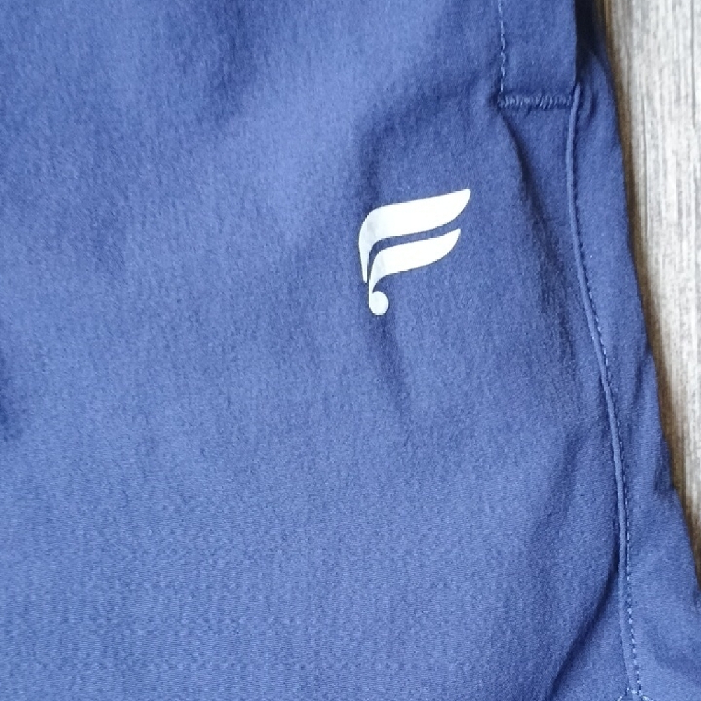 Fabletics Deep Blue Performance Shorts - Picture 2 of 14